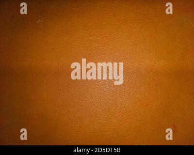 Red elegance leather texture for background with visible details.Pink leather texture background.grunge leather background, ough genuine camel leather. Stock Photo