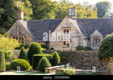 The manor house dating back to the 15th century in the Cotswold village of Temple Guiting, Gloucestershire UK Stock Photo