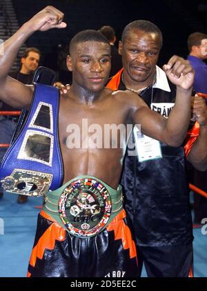 Mind Hub Trickle WBC super featherweight champion Floyd Mayweather Jr. of Las Vegas poses  with his father after defeating[ Goyo Vargas of Mexico City] at the MGM  Grand Garden in Las Vegas March 18. The