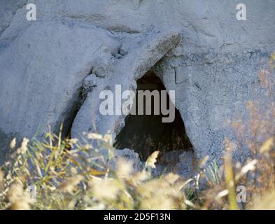 Spain, Andalusia, Almeria province, Antas. Argaric Culture. It was developed in Southeastern Spain, between c. 1900 BC-1300 BC. El Argar Bronze Age site. Detail of the entrance to one of the existing caves in the hill located in the outskirts of the village. Stock Photo