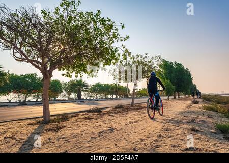 Bicyclist morning ride in Al khobar corniche -Saudi Arabia. Stock Photo