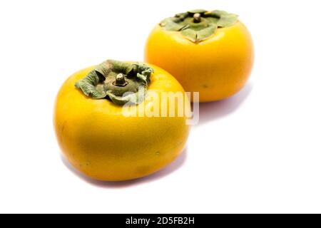 Persimmon fruit isolated on white background Stock Photo