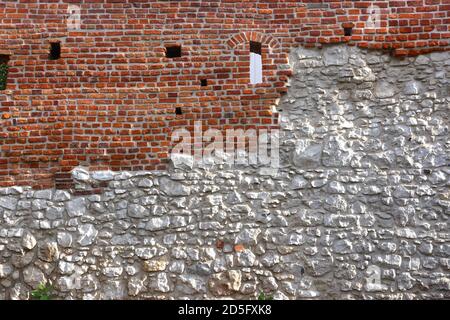 Cracow. Krakow. Poland. Medieval brick and limestone wall. Stock Photo