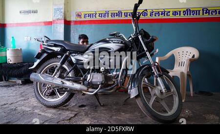 22 September 2020 : Reengus, Jaipur, India / Working mechanic bikes on a motorcycle workshop. Stock Photo