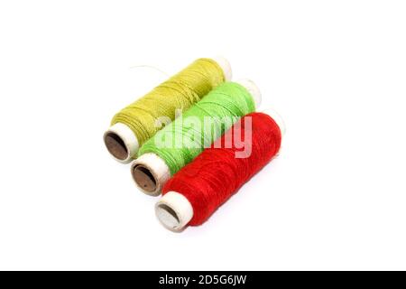 A picture of thread rolls on white background Stock Photo
