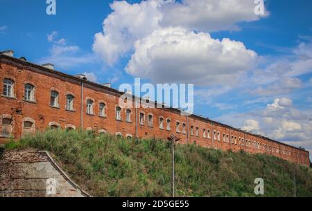 Red brick barracks building within the Modlin Fortress is one of the longest buildings in Europe Stock Photo