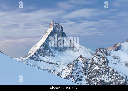 Matterhorn in Zermatt. Amazing views over the snowy Swiss and Italian alps. Beautiful sunny day in christmas time, happy new year celebrated in mount Stock Photo