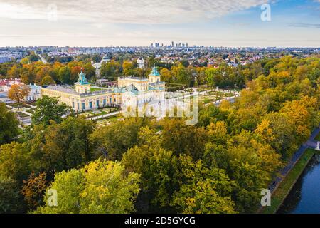 Autumn in Wilanow palace garden, Warsaw distant city center aerial view in the background Stock Photo