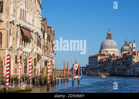 The Basilica di Santa Maria della Salute viewed from the Grand Canal on a sunny spring afternoon Stock Photo