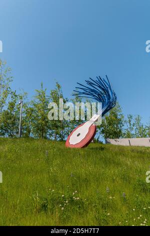 Large sculpture of wheel typewriter eraser with brush in Olympic Sculpture Park in Seattle, Washington.  Image taken in 2009. Stock Photo