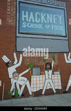 Sign board at a school that re-opened with free meals for children with restrictions due to Coronavirus / Covid-19 pandemic in London, England, UK Stock Photo