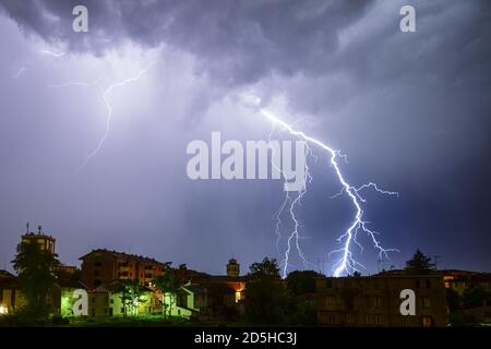 lightning storm during a winter night Stock Photo