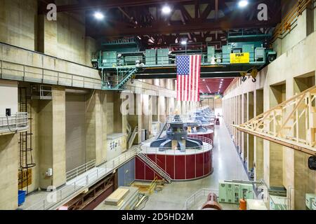 NEVADA, USA - May 21, 2012. Inside the turbine room powerplant of Hoover Dam in Nevada, USA. The dam produces hydroelectric renewable energy. Stock Photo