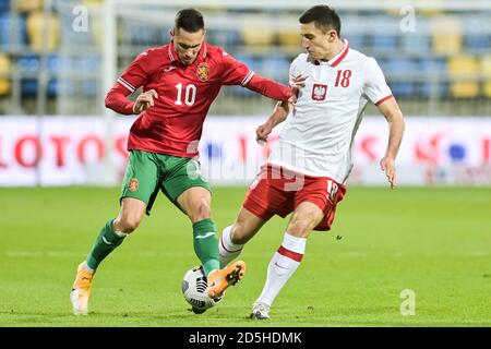 Stanislav Ivanov of Bulgaria (L) and Bartosz Slisz of Poland (R) are seen in action during football U-21 European Championships 2021 Qualifiers match between Poland and Bulgaria at the City Stadium in Gdynia.(Final score: Poland 1:1 Bulgaria) Stock Photo