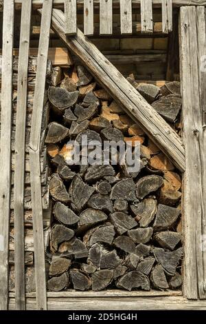 firewood in a rural barn Stock Photo