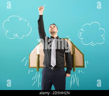 Businessman flies with a fast rocket. Concept of ambition and determination. Stock Photo