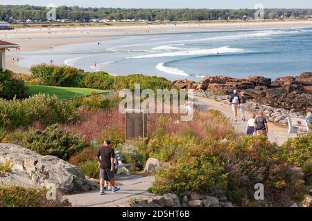 Tourists walking along scenic cliffs of coastal Marginal Way in Ogunquit, Maine. Stock Photo