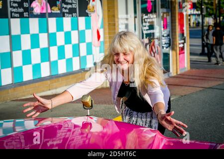 Pink Cadillac car with microphone hood ornament, , Brogans Diner, Langley, British Columbia, Canada Stock Photo