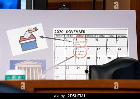 A sign is seen during a Senate hearing on Capitol Hill, Wednesday, Sept ...