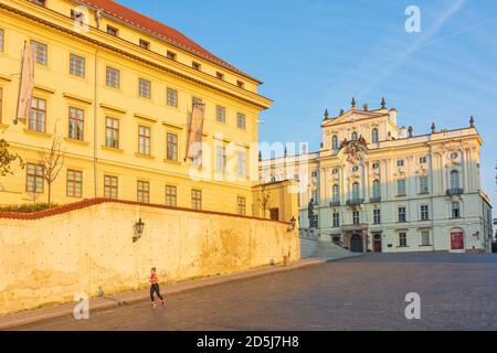 Praha: Salm Palace (Salmovsky palac), part of National Gallery Prague (left), Archbishop’s palace (right), square Hradcanske namesti in Hradcany, Cast Stock Photo