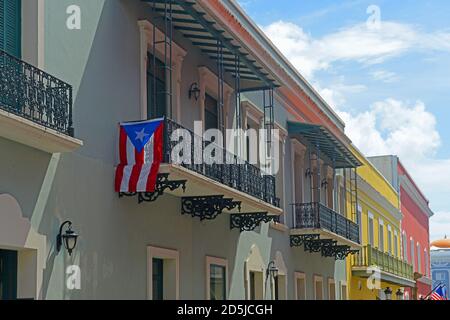 Historic building on Calle de la Fortaleza at Calle del Cristo in Old San Juan, Puerto Rico. Stock Photo