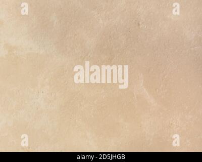 Beige low contrast smooth decorative plaster background Stock Photo