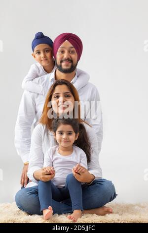 Vertical shot of mother and daughter spending time together indoors ...