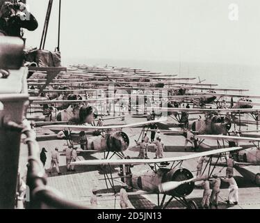 The Japanese “Kaga” aircraft carrier conducts flight operations during the Japan-China War in 1937. China. May 1937 On the deck of “Kaga” aircraft car Stock Photo