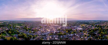 Sunset ariel panorama of the Market Town of Spalding in Lincolnshire, UK from Ayscoughee Hall and Little London to Pinchbeck and the power station. Stock Photo