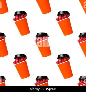 Seamless pattern Cup of Raspberries. Fresh sweet raspberries in a red cup on white background. Food background. Summer snack Stock Photo