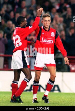 L-R: Bryan Roy and Lars Bohinen, Nottingham Forest, celebrate Forest's first goal against Wimbledon  Stock Photo