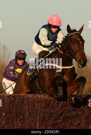 Helpston ridden by jockey David England jumps the last fence to win the Prince's Trust Novices' Steeple Chase at Fakenham Racecourse Stock Photo