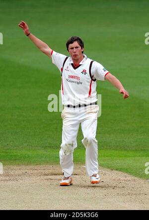 Lancashire's Simon Kerrigan toils away in the morning session without any luck Stock Photo