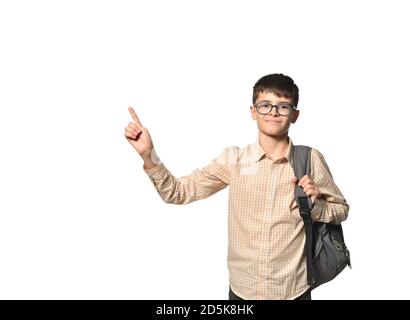 Schoolboy boy in glasses shows points a finger up Stock Photo