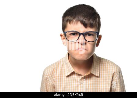 Boy face with dislike and disgust emotions on white isolated background Stock Photo