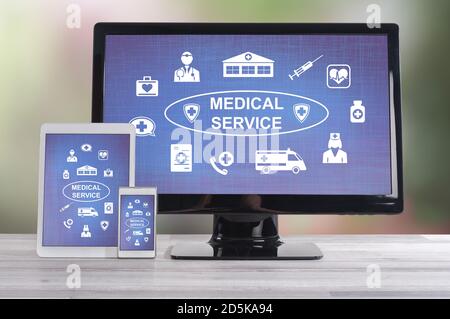 Medical service concept shown on different information technology devices Stock Photo