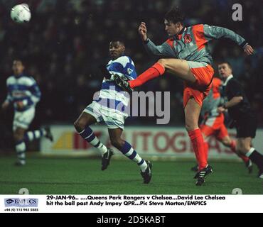 29-JAN-96.  ....Queens Park Rangers v Chelsea. David Lee of Chelsea hits the ball past Andy Impey (QPR) Stock Photo