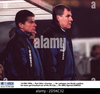 14-FEB-1996 ... Port Vale v Everton  ... An unhappy Everton manager Joe Royle (right) with Willie Donachie watch their team get knocked out of the FA Cup Stock Photo