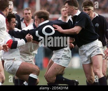 Scotland v England - Five Nations - England's Will Carling brings down Scotland's Gregor Townsend. Stock Photo