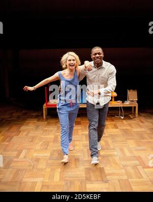 Lily James (Katrina), Obi Abili (Simon) in PLAY HOUSE by Martin Crimp at the Orange Tree Theatre, Richmond, Surrey, England  16/03/2012  design: Sam Dowson   lighting: John Harris   director: Martin Crimp