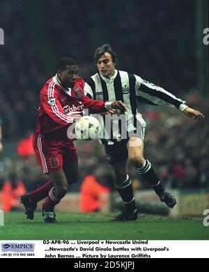 Newcastle United's David Ginola battles with Liverpool's John Barnes Stock Photo