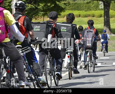 Uber Eats deliverers take a training course on road safety in 