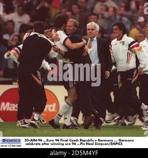 Germany manager Berti Vogts celebrates with his team after winning Euro 96 Stock Photo