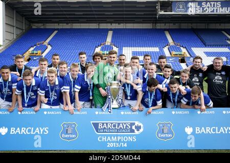 Everton players celebrate with the Under 18 Premier League trophy Stock Photo