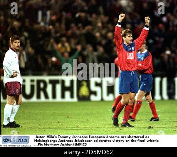 Aston Villa's Tommy Johnsons European dreams are shattered as Helsingborgs Andreas Jakobsson celebrates victory on the final whistle Stock Photo