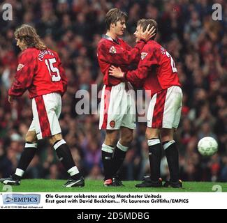 Ole Gunnar Solskjaer celebrates scoring Manchester United's first goal with David Beckham Stock Photo