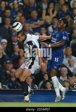 Chelsea's Didier Drogba and West Bromwich Albion's Neil Clement battle for the ball Stock Photo
