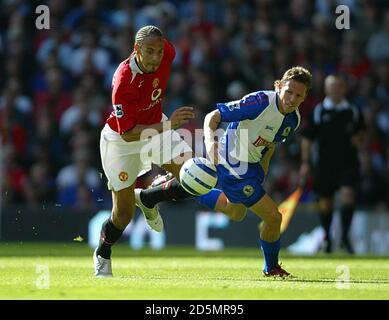 Manchester United's Rio Ferdinand (L) in action against Blackburn Rovers'  Craig  Bellamy Stock Photo