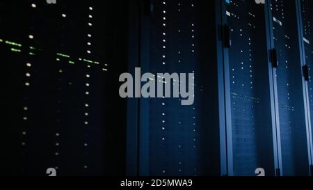 Close-Up Shot of Fully Operational Server Racks in Data Center. Modern Telecommunications, Cloud Computing, Artificial Intelligence, Database, Super Stock Photo