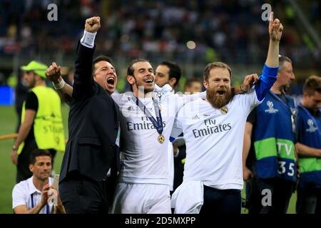 Real Madrid's Gareth Bale (centre) celebrates after his side's victory over Atletico Madrid Stock Photo